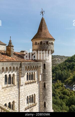Stone walls of historic Basilica of St-Sauveur blend into the cliff in Rocamadour, France Stock Photo