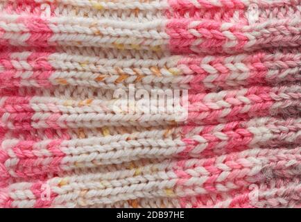 knitted pink texture, full frame, warm woolen clothes, close up Stock Photo