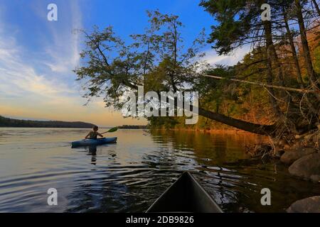 Kayakers in Carry Falls Reservoir, New York, USA Stock Photo