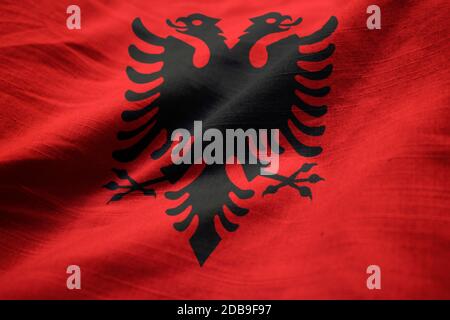 Ruffled Flag of Albania Blowing in Wind Stock Photo