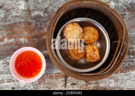 Hoi Jo or deep fried crab meat roll is Thai Traditional one of menu in dim sum restaurant Stock Photo