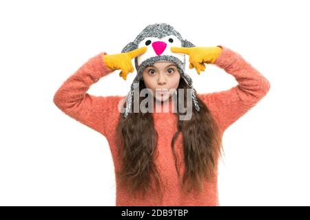 looking brand new. child cosy sweater isolated on white. cold winter weather. warm clothes and accessory fashion for kids. happy childhood. small girl in knitted hat and gloves. xmas holiday activity. Stock Photo