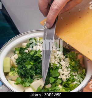 The process of cooking vegetable stew. Stock Photo