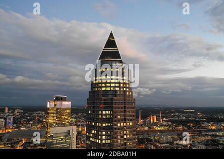 Incredible Aerial Close Up View of Messeturm in Frankfurt am Main, Germany Skyline at Night with City Lights HQ Stock Photo