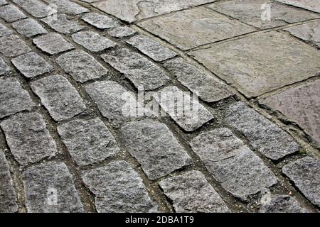 Very old pavement made from cobble stone Stock Photo