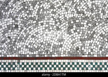 Very old pavement made from cobble stone Stock Photo