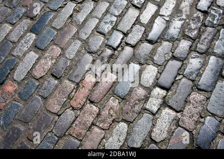 Very old road made from cobble stone Stock Photo