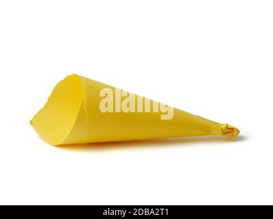 cone-rolled cardboard sheet of paper isolated on white background, empty eco-bag for bulk products Stock Photo