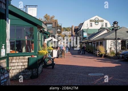 This is a very busy tourist trap with beautiful shops, galleries, restaurants and boats lining the wharves. Directly on Newport Harbor, busy in summer. Stock Photo