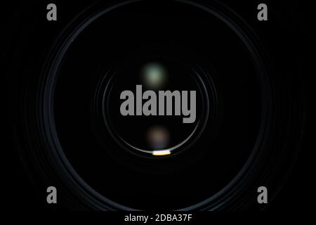 Hidden camera. Camera lens on in the dark. Camera tracking. Macro Stock Photo