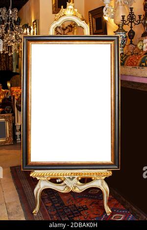 Floor easel with empty frame isolated included clipping path Stock Photo