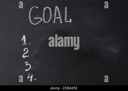 black chalkboard with inscription gosl and list, concept of planning and strategy Stock Photo