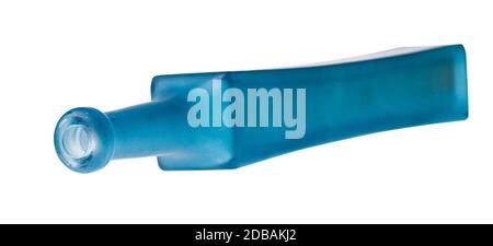 lying empty matte blue glass bottle isolated on white background Stock Photo
