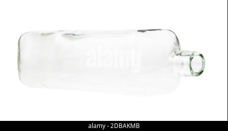 lying empty clear whiskey bottle isolated on white background Stock Photo
