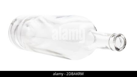 lying empty clear bottle isolated on white background Stock Photo