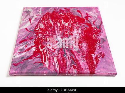 painting without frame with red blob and pink acrylic image on white background Stock Photo