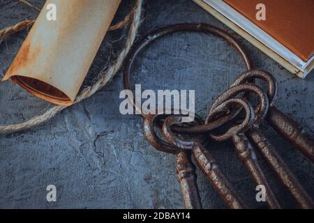 old keys and symbols in wood and with little natural light Stock Photo