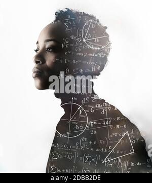 Silhouette of woman covered with mathematical formulas Stock Photo