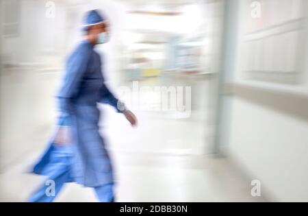 Doctor running in hospital Stock Photo