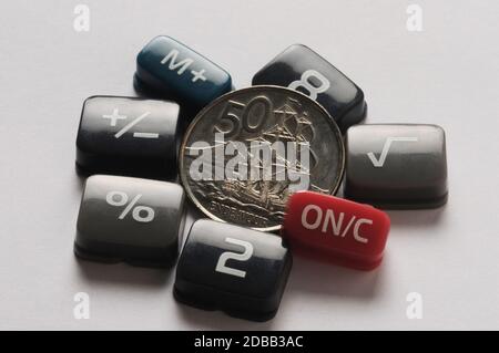 New Zealand coin with calculator keys Stock Photo