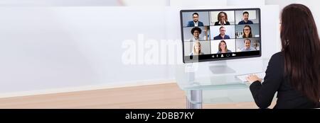 Work From Home Video Conferencing Call On Computer Stock Photo