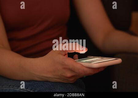 Close-up of woman's hand holding smart phone Stock Photo