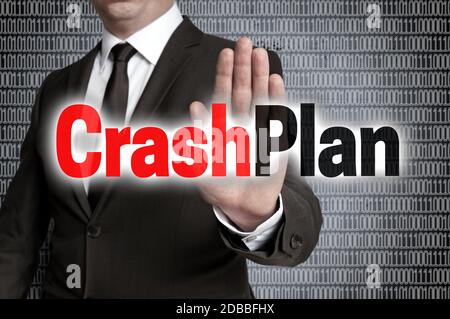 Crashplan with matrix is shown by businessman. Stock Photo