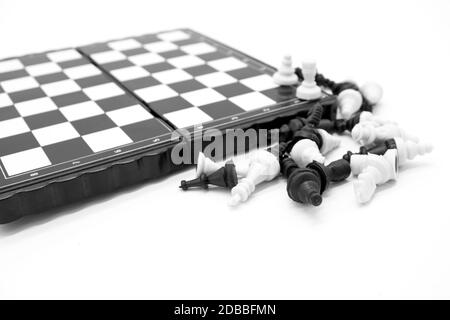 Pocket plastic chess game, checkers on magnets isolated on white background Stock Photo