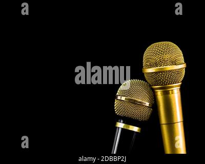 Two microphone on black background.  Object for entertainment concept. Stock Photo