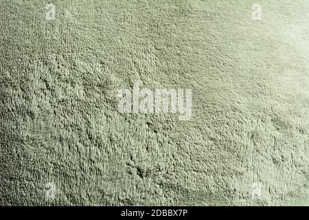 Full frame background of green suede surface. Stock Photo