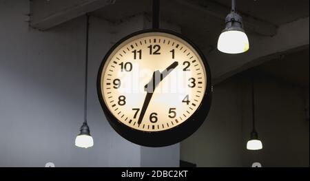 Como, Italy - November 4, 2017: cable car station clock showing 1h33 in the city center on a fall day Stock Photo