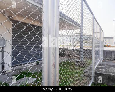 The Transformer station closed fence with barbed wire Stock Photo