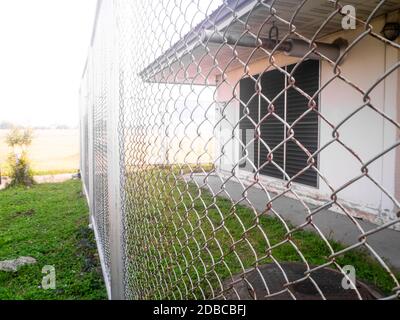 The Transformer station closed fence with barbed wire Stock Photo