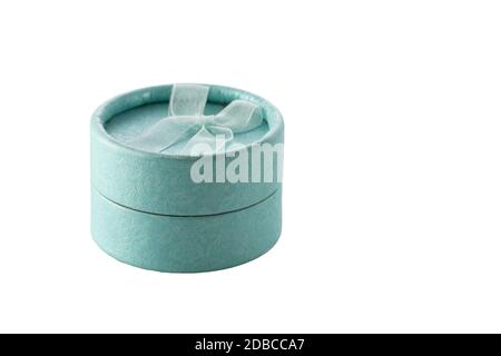 Turquoise, blue round gift box for jewelry isolated on white background. Wedding, romantic concept. Jewelry. Stock Photo