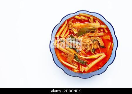 Red curry preserved bamboo shoot with pork, white background. Stock Photo