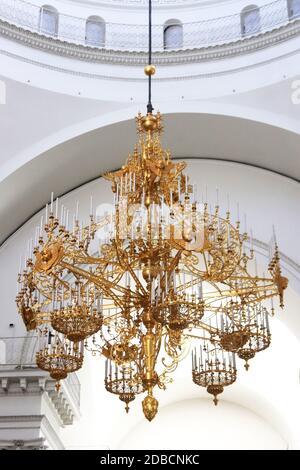 Chandelier in the center of the hall of Trinity Izmailovsky Cathedral. Cathedral of the Holy Life-Giving Trinity of the Life Guards Izmailovsky Regime Stock Photo