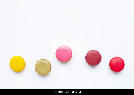 Colorful macarons isolated on white background. Stock Photo
