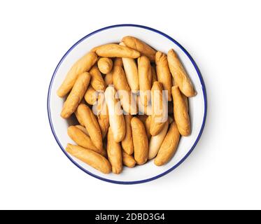 Mini bread sticks in bowl isolated on white background. Stock Photo