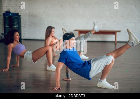 Students learning break-dance choreography during the dance class Stock Photo