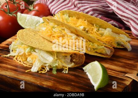 Fresh home made tacos on a chopping block Stock Photo