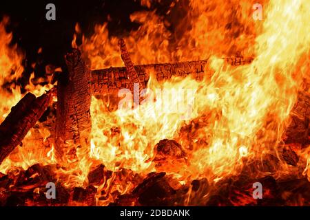 A big glowing fire with high flames Stock Photo