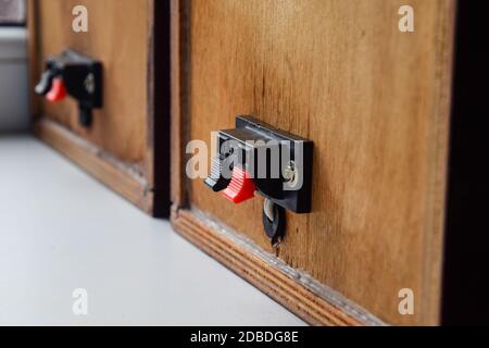 The back of the speakers. Terminals for attaching speaker wires to the speaker. Column speaker 15AS-208. Vintage Soviet bookshelf acoustics. Stock Photo