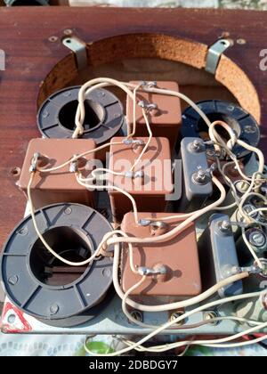 Acoustic filter - crossover, Amphiton 35AC-018 vintage acoustic system. Capacitors and coils on the circuit board. Stock Photo