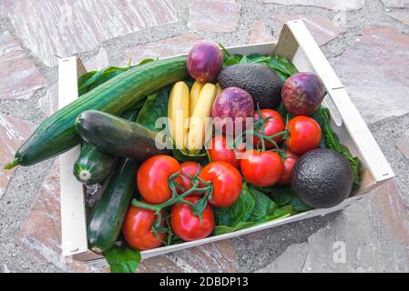 Vegetables and fruits in basket Stock Photo