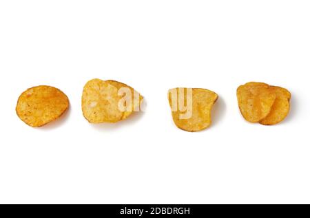 various potato chips with spice isolated on a white background, top view Stock Photo