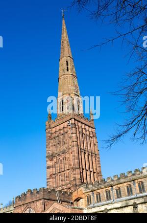 Steeple spire tower of Holy Trinity church against blue sky, Coventry, England, UK Stock Photo