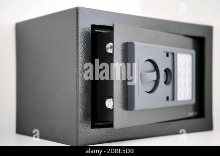 Built into the wall safe-deposit with opened door close up view Stock Photo