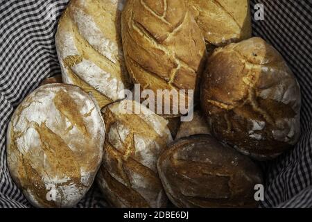Bread in a wicker basket, detail of daily basic food Stock Photo