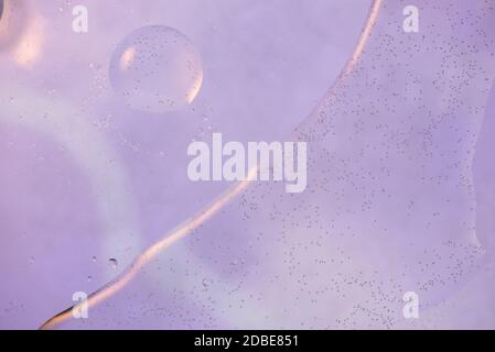 Oil drops in water. Defocused abstract psychedelic pattern image pastel colored. Abstract background with colorful gradient colors. Stock Photo