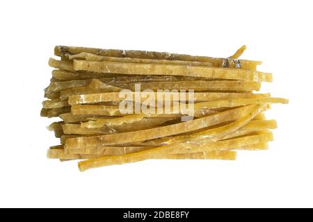 Dried salted tuna elite snack isolated on white background. Snack Fish to beer. Close up. Stock Photo